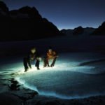 Flashlight lit crevasses (made by submerging a light into the water filled crevass) in the Gilkey Trench. The Juneau Icefield Research Program, one of the longest running climate data records in the world, and an outdoor classroom that has trained environmental scientists since 1946.
