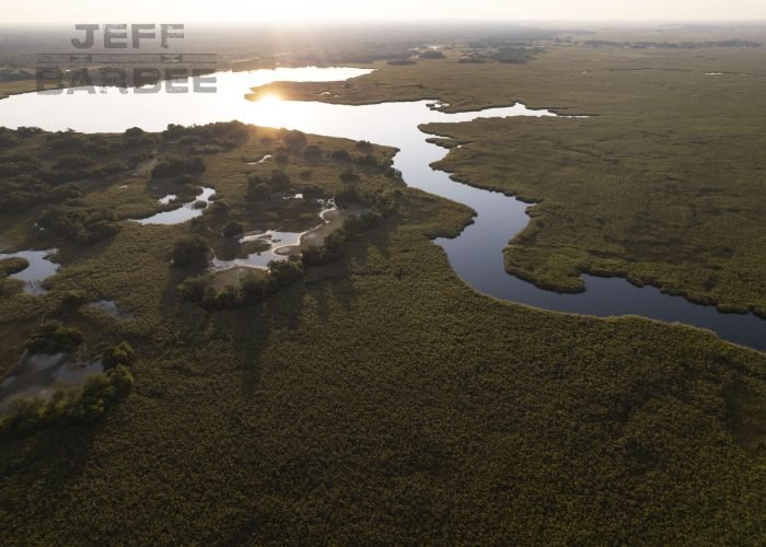 The western side of the Okavango Delta is a menagerie of islands, channels and lagoons, many of them kept open by the movement of elephants and hippos.From Tsodilo Hills to the western edge of the Okavango Delta, across to the Kwai River in the Mababe area and down to the Boteti River, these images are a record of the people and places in this vast wilderness under threat.