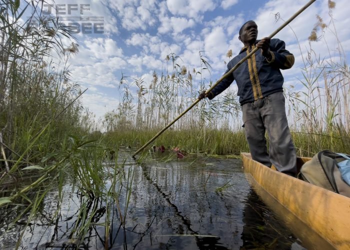Joseph or "Jay" Haikera is a freelance Makoro poler who works for Nguma Island Lodge. He is from Etsa 13 in Botswana and has been working alongside the Jokotsha Community Trust to help it re-establish strong community conservation projects in the watern part of the Okavango Delta.From Tsodilo Hills to the western edge of the Okavango Delta, across to the Kwai River in the Mababe area and down to the Boteti River, these images are a record of the people and places in this vast wilderness under threat.